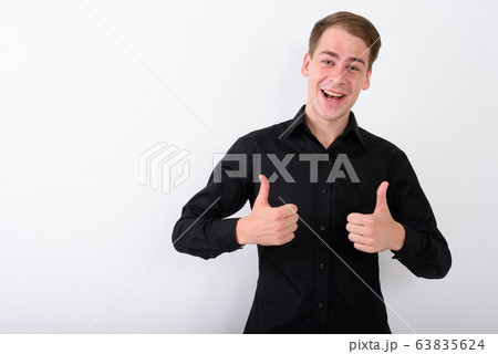 Young handsome businessman against white background 63835624