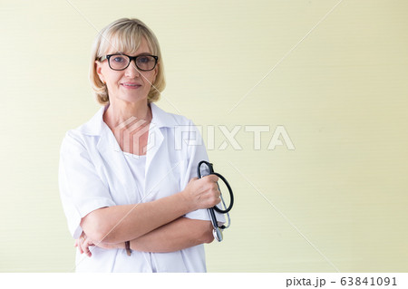 Female doctor with stethoscope in hands blur 63841091