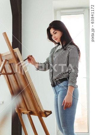 Artist at work in home studio. Remote work Artist at work in home studio. Remote work 63841172