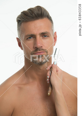 Vintage style shaving. Bearded man and female hand 63843358