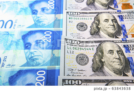 Israeli and American banknotes. 63843638