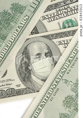 Portrait of Franklin on 100 dollar banknote with medical mask 63843913