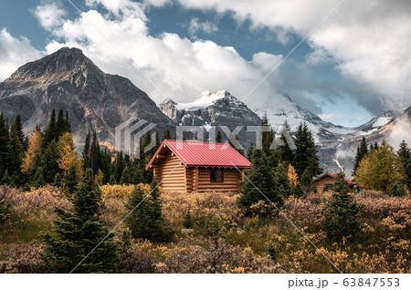 Wooden huts with rocky mountains in Assiniboine 63847553
