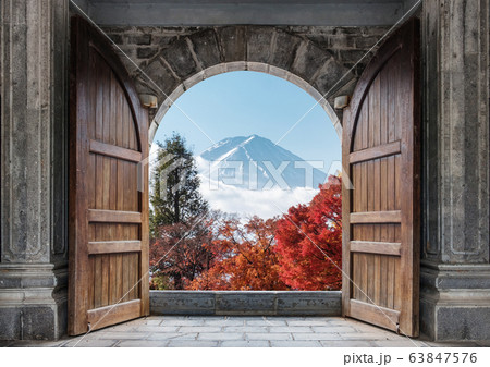 Open large wooden door with mount Fuji-san and 63847576