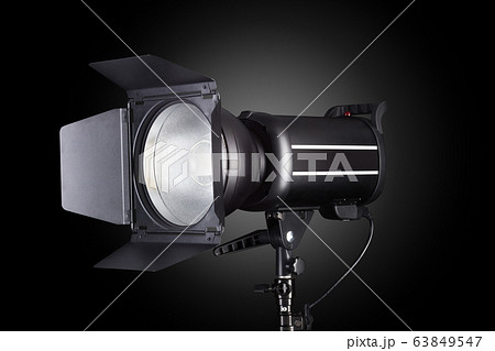 Photography studio flash isolated on black Photography studio flash isolated on black 63849547