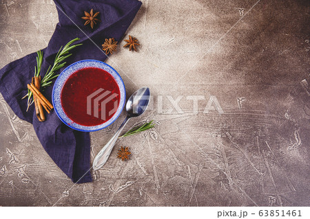 Fresh cranberry apple sauce in blue bowl 63851461
