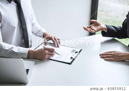 Employer arriving for a job interview, committee 63853912