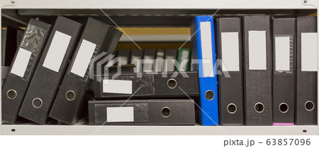 A few of archive folders in the office shelf. A few of archive folders in the office shelf. 63857096