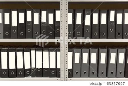 A lot of folders in the archive shelf. A lot of folders in the archive shelf. 63857097
