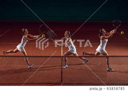 Young caucasian professional sportswoman playing tennis on sport court background, collage with action concept Young caucasian professional sportswoman playing tennis on sport court background, collage with action concept 63858785