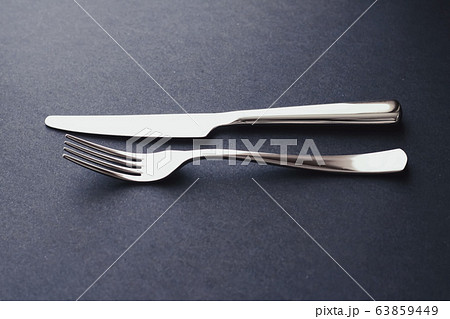 Fork and knife, silver cutlery for table decor, minimalistic design and diet Fork and knife, silver cutlery for table decor, minimalistic design and diet 63859449