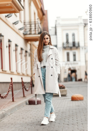 Young beautiful woman in a knitted sweater  63860960