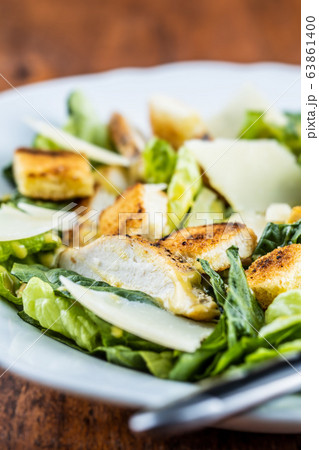 Chicken Caesar Salad with Cheese and Croutons 63861400