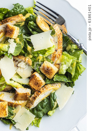 Chicken Caesar Salad with Cheese and Croutons 63861401
