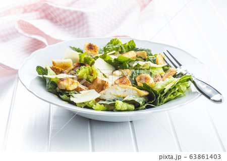 Chicken Caesar Salad with Cheese and Croutons 63861403