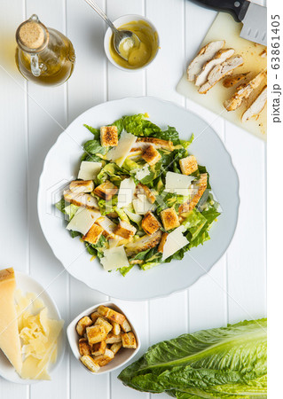 Chicken Caesar Salad with Cheese and Croutons 63861405