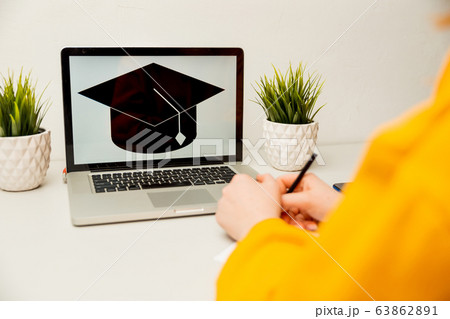 girl reading college or university application or document from school. College acceptance letter or student loan paper. Applicant filling form or planning studies. girl reading college or university application or document from school. College acceptance letter or student loan paper. Applicant filling form or planning studies. 63862891