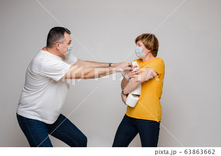 A couple in love hugs together and stands in 63863662
