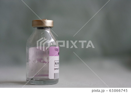 Empty vial of  antibiotics, injection drugs used in treatment of  patients with pneumonia caused by coronavirus covid 19. Empty vial of  antibiotics, injection drugs used in treatment of  patients with pneumonia caused by coronavirus covid 19. 63866745