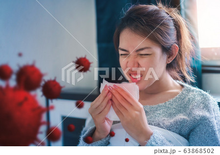 Sick asian woman have hight fever flu and sneezing 63868502