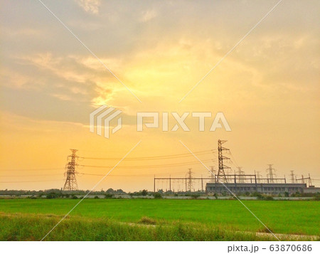 High voltage transmission Electric towers on countryside High voltage transmission Electric towers on countryside 63870686