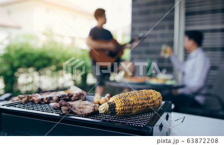 Close up grilled meats and various food on the Close up grilled meats and various food on the 63872208