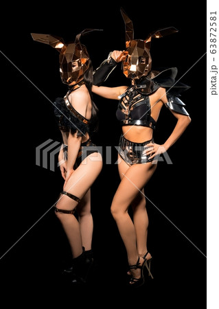 Slim girls in bdsm style lingerie and masks view 63872581