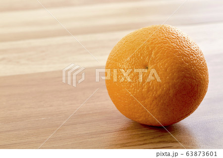 Fresh orange fruit on wooden table 63873601