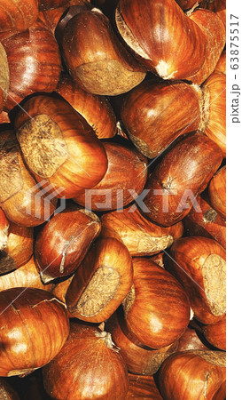 Ripe chestnuts close up, top view. Food background 63875517