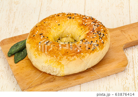 Hot tasty Uzbek flatbread for snack Hot tasty Uzbek flatbread for snack 63876414