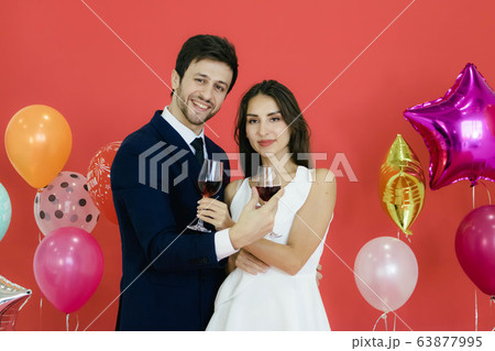 Young couple celebrating new year together. 63877995