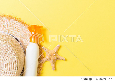 Sunscreen bottles with starfish and sunhat on Sunscreen bottles with starfish and sunhat on 63879177