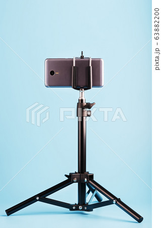 Smartphone on a tripod as a photo-video camera on Smartphone on a tripod as a photo-video camera on 63882200