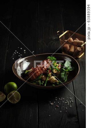 Grilled fish steak with broccoli and cauliflower. catering menu 63889394