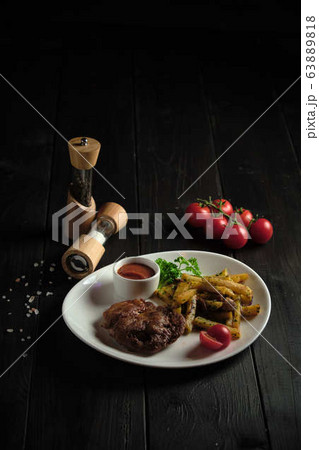 Meat medallion and french fries . catering menu Meat medallion and french fries . catering menu 63889818