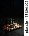 Glass of cold beer with appetizer. catering menu 63890102