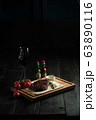 Meat steak on a wooden board. catering menu 63890116