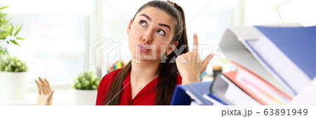 Girl is unhappy with number folders man carries Girl is unhappy with number folders man carries 63891949