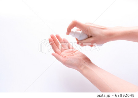 bottle with antibacterial antiseptic gel in hand 63892049