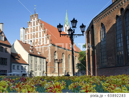 St. John's Church in Riga, Latvia, flowers in the foreground 63892283