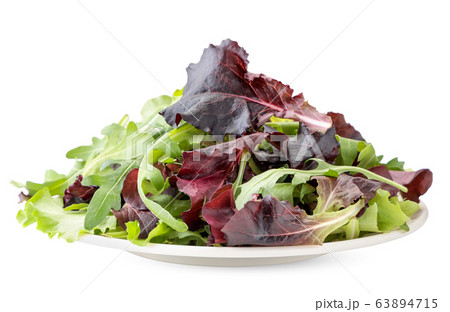 Salad of arugula leaves and red beets in a plate Salad of arugula leaves and red beets in a plate 63894715