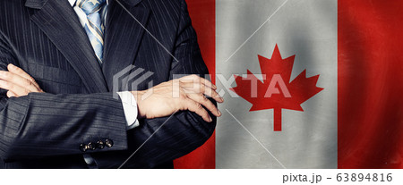Politician  crossed arms of on Canada flag 63894816