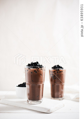 Milk Bubble Tea with Tapioca Pearls. . Milk Bubble Tea with Tapioca Pearls. . 63895931