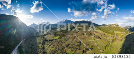 Aerial panorama of valley, morning fog over Aerial panorama of valley, morning fog over 63898156
