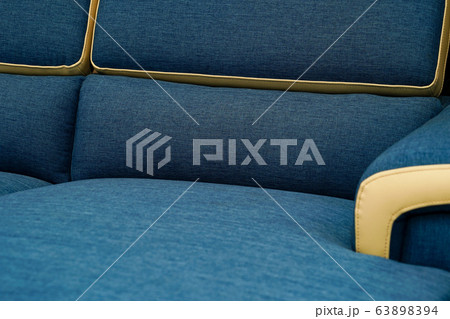 Light blue fabric sofa, close up detail texture. Furniture showroom photography 63898394