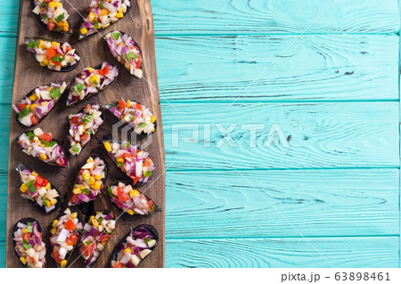 Traditional  Peruvian food background with mussels 63898461