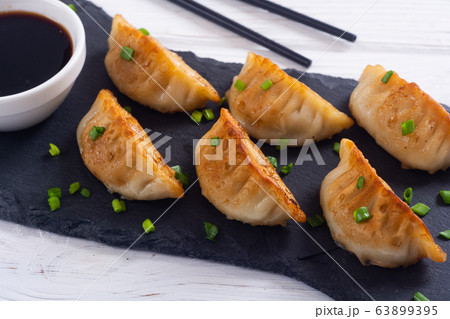 Traditional asian dumplings gyoza Traditional asian dumplings gyoza 63899395