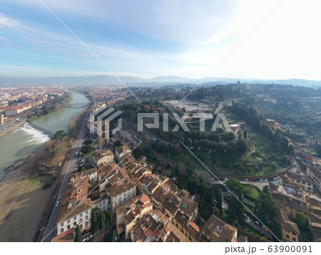 Aerial panorama of Florence at sunrise, Firenze, Tuscany, Italy, cathedral, river, drone pint view, mountains is on background 63900091