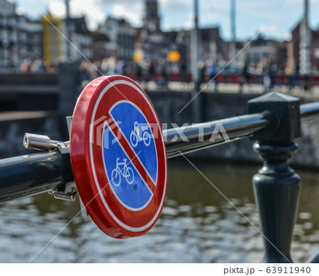 No Bicycle Parking Sign at the steel fence No Bicycle Parking Sign at the steel fence 63911940