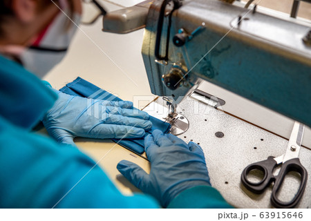 Making a protective face mask on sewing machine 63915646